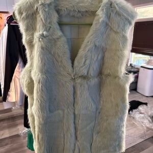 Green Sleeveless Vest with High Collar and Plush Texture